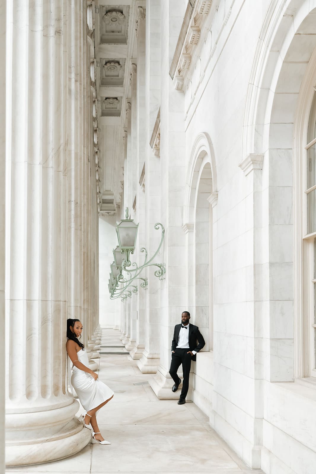 Elegant couple portraits at the Byron White Courthouse marble walkway