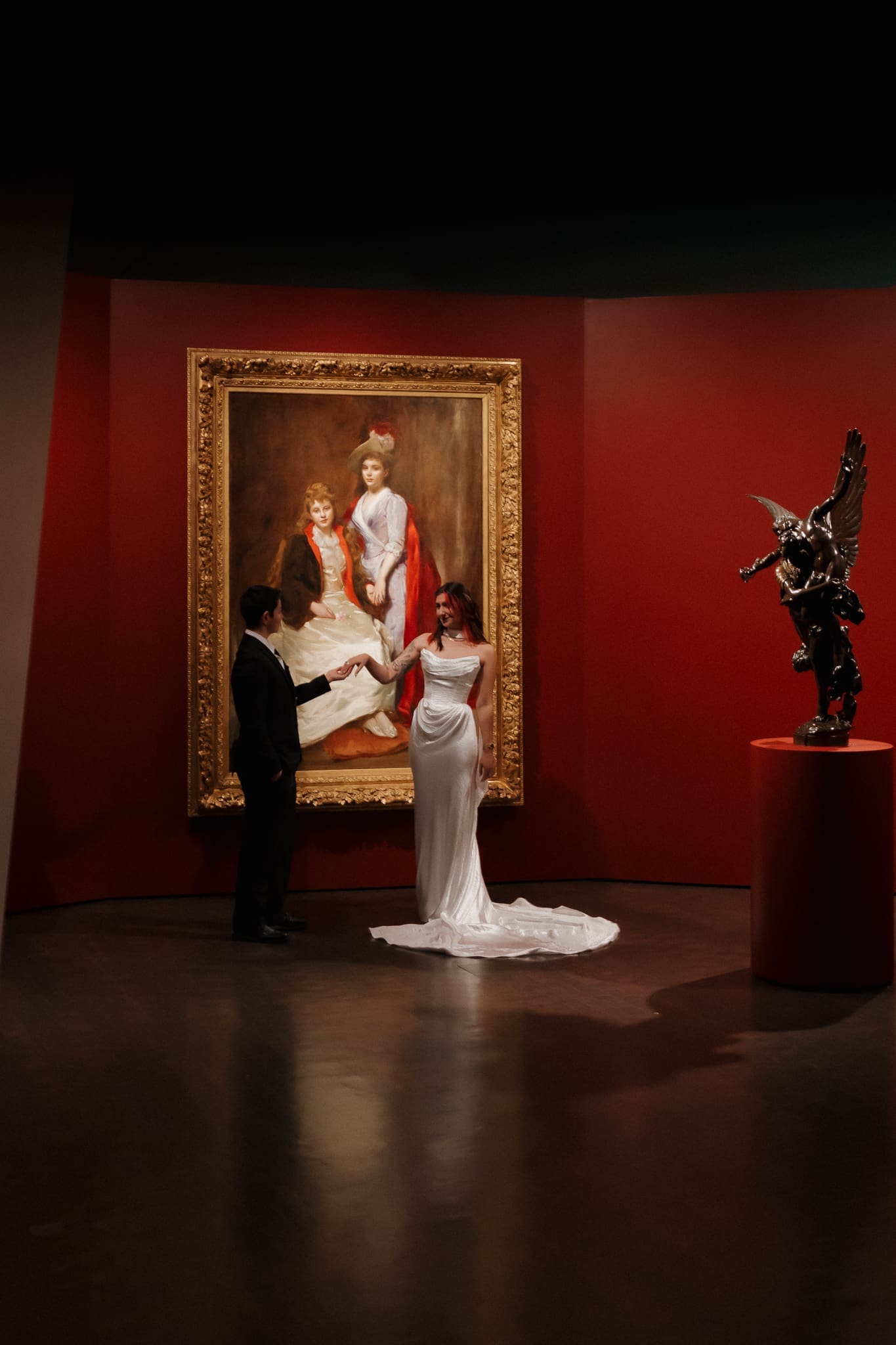 Moody Denver Art Museum elopement portraits with dramatic gallery lighting