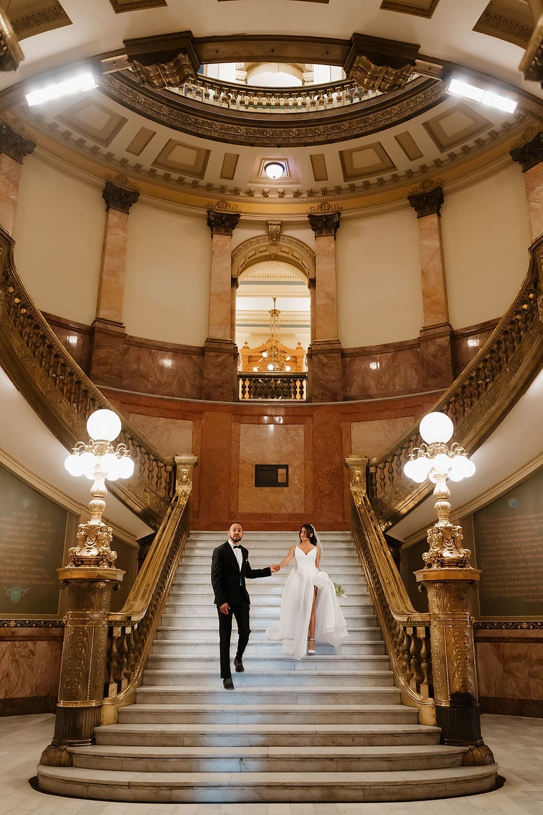 Elegant courthouse staircase for a downtown Denver wedding portrait