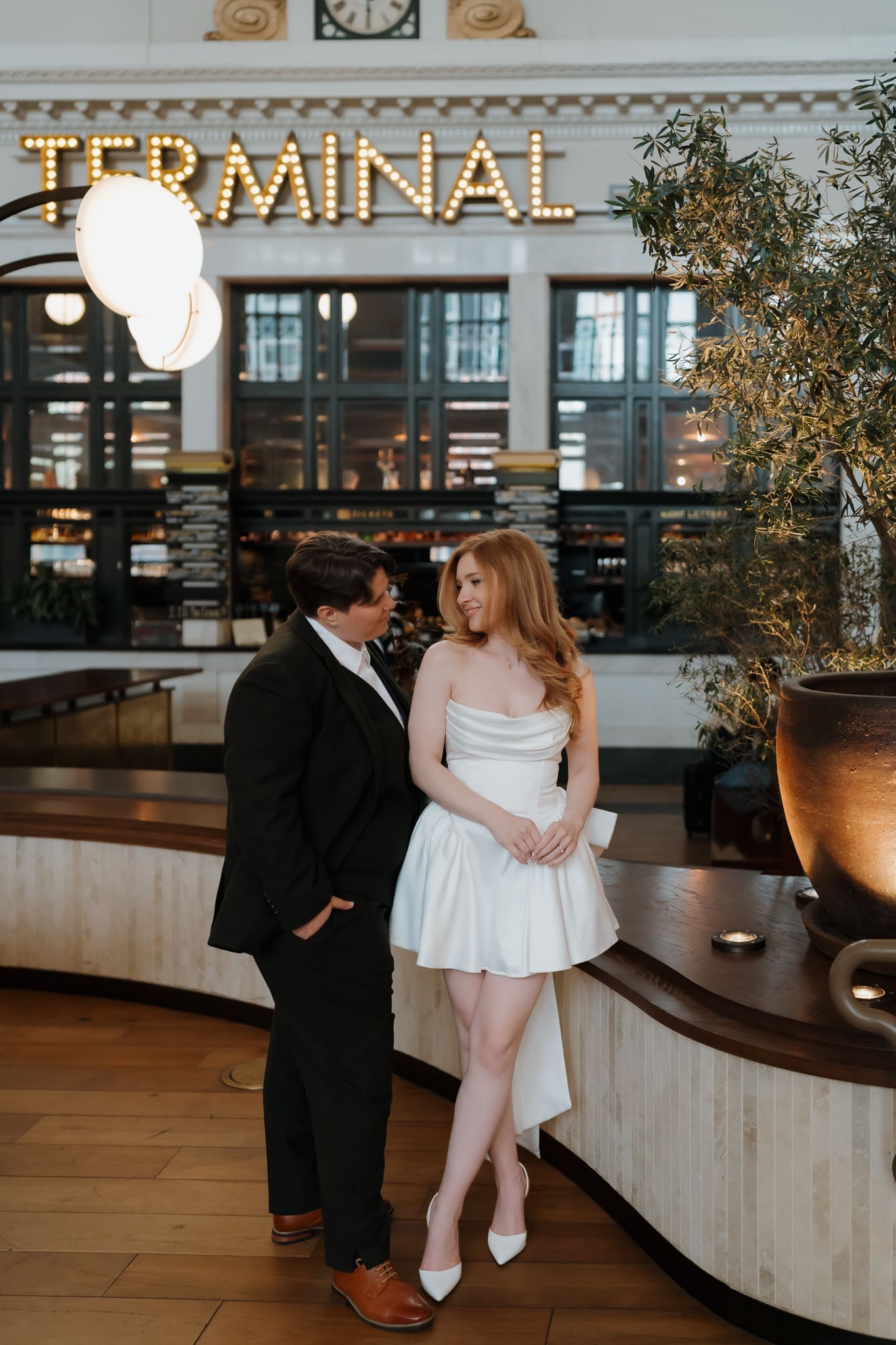 Stylish couple portraits inside Union Station during a Denver elopement