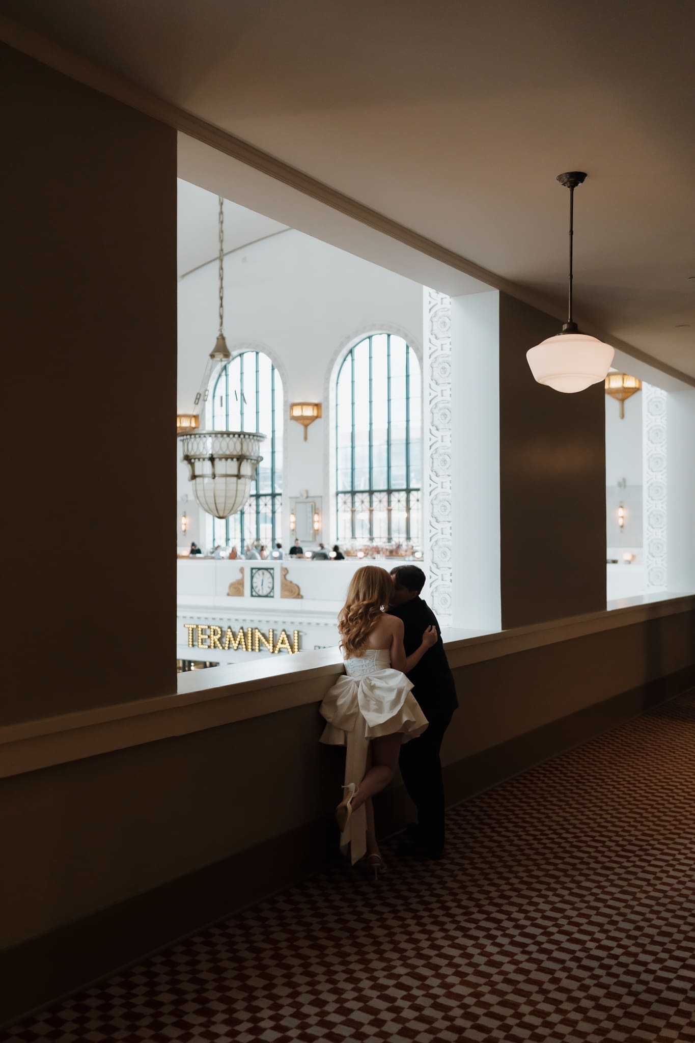 Romantic downtown Denver wedding portraits overlooking Union Station terminal