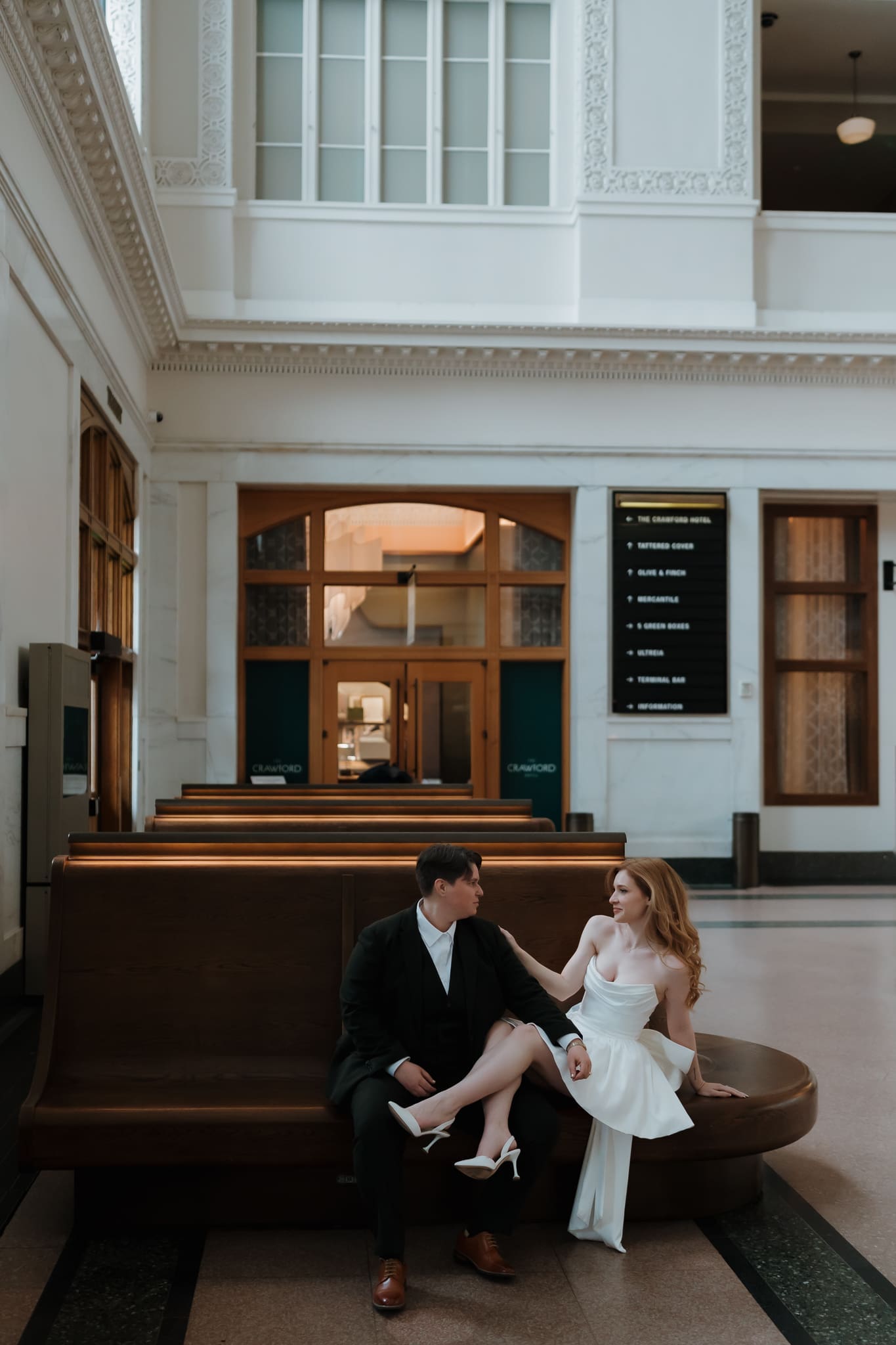 Editorial wedding portraits inside historic Union Station in downtown Denver
