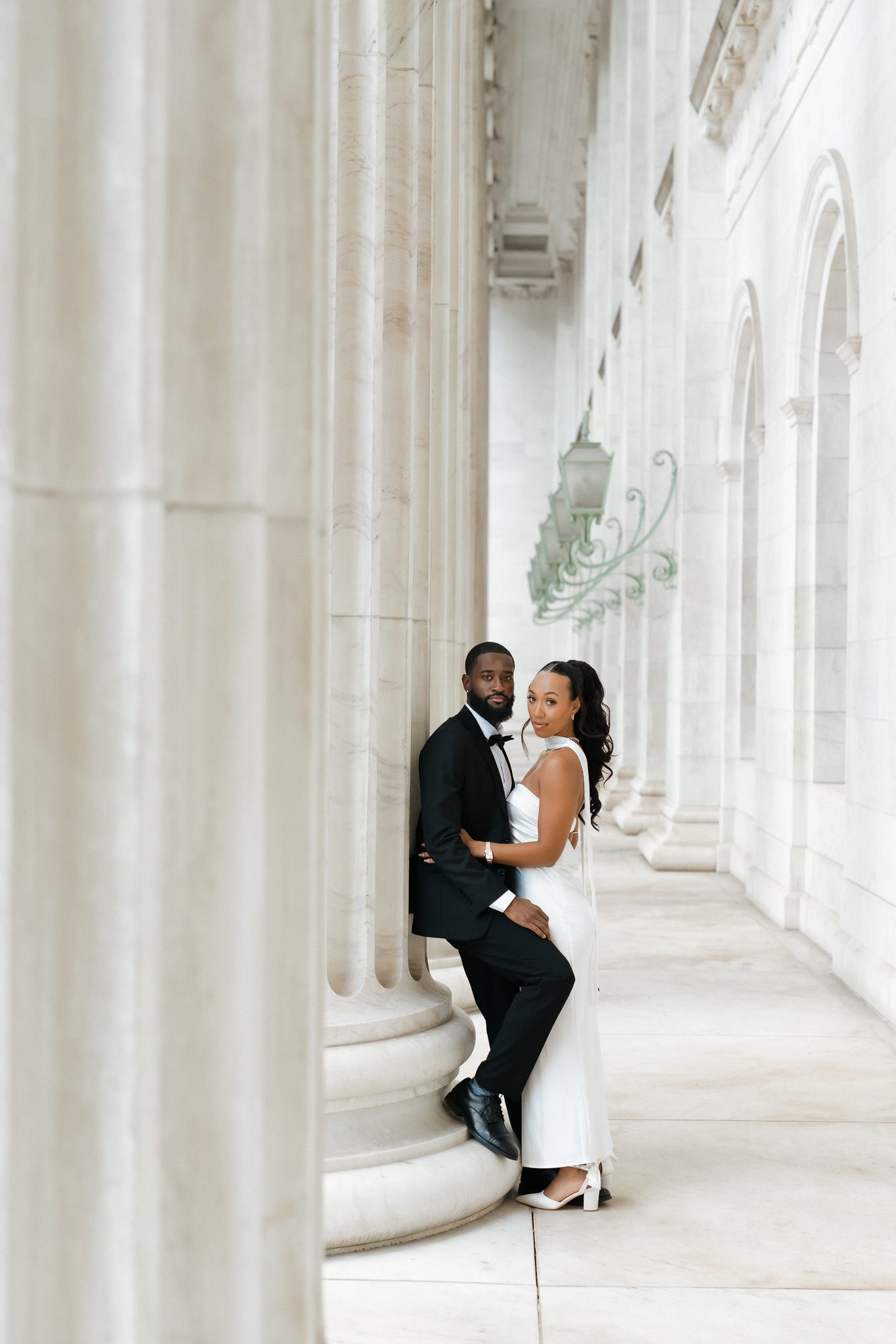 Colorado Engagement Session Locations Couple embracing inside a historic downtown Denver building during their Colorado engagement session