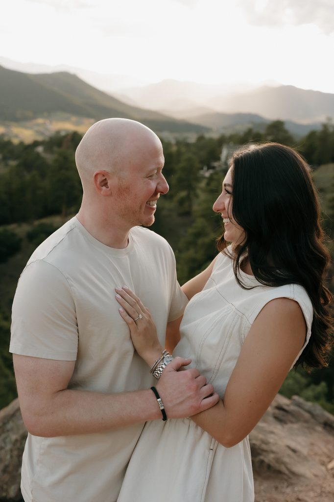Colorado Engagement Session Locations Close-up of an engaged couple sharing an intimate moment during their Mount Falcon Park Colorado engagement session
